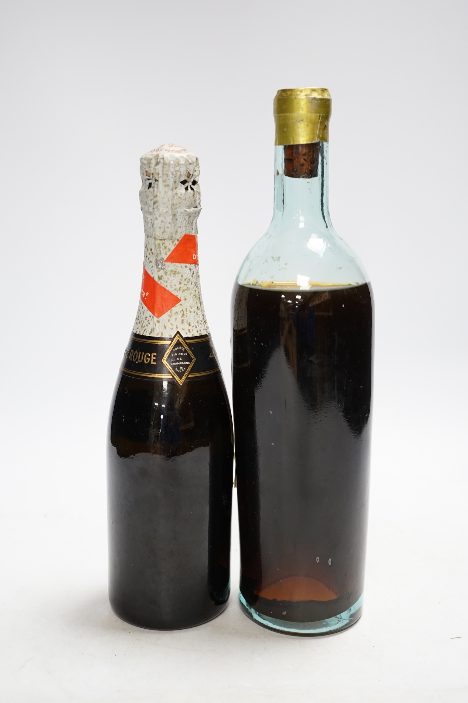 One bottle of Chateau d'Yquem 1939 and one half bottle of G.H. Mumm & Co 1928 Champagne